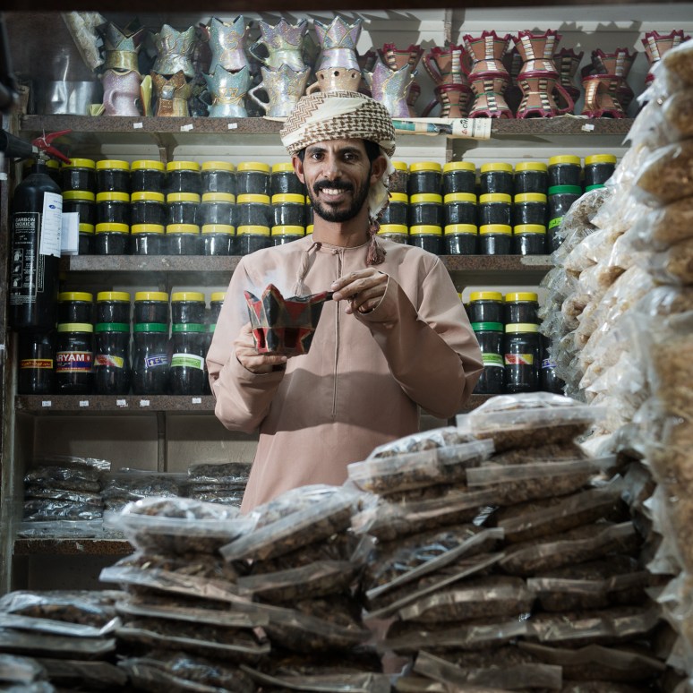 Frankincense trader sampling his product 